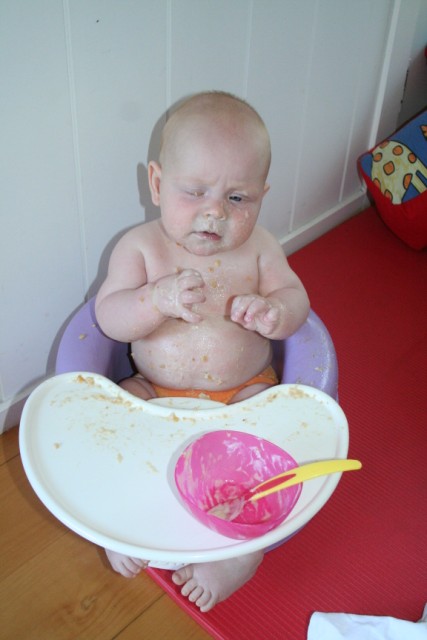 messy eating baby